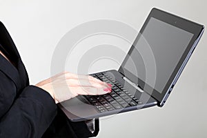 Business Women Typing on laptop keyboard