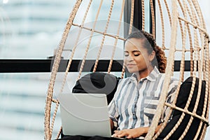 Business women using tablet computer to work with financial data in the modern office, relax and rest time after work.