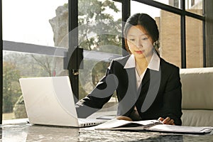 Business women working with laptop