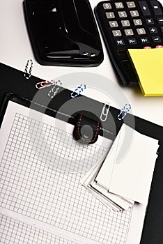Business and work concept: office tools on black and white