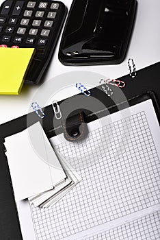 Business and work concept: office tools on black and white
