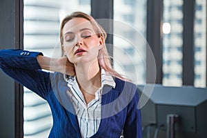 Business worker feeling tired frustrated stressed from hard work and massage necks to relieve pain and tension from office