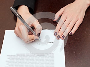 Business worker signing the contract