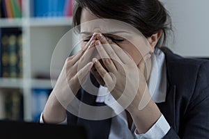 Business worker with sinus pain photo