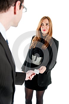 Business workers exchanging business cards
