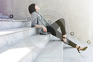 Business Working Woman sit on stair in relaxation posture,