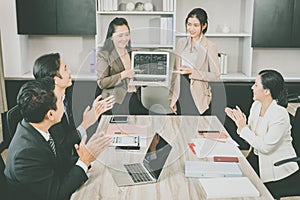 Business Working Women Presentation in Meeting room with people glad applause and clapping hand