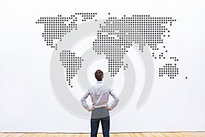 Business worldwide, international company, businessman looking ar the world map