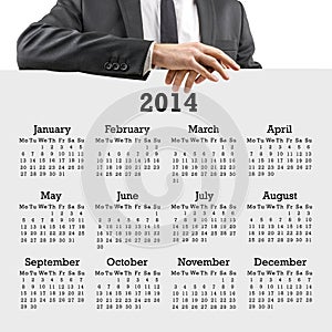 Businessman with a 2014 calendar