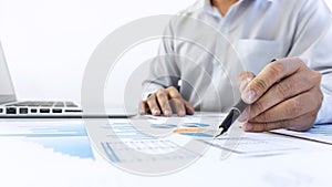 Businessman accountant working audit and calculating expense fin