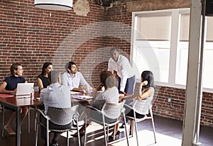 Businessman Addressing Boardroom Meeting