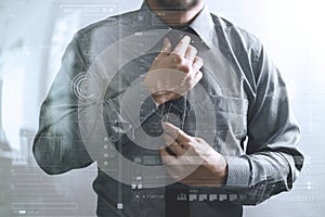 Businessman adjusting tie,Front view, no head. Concept of working in an office.