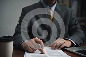 businessman agree to make deal signing document, sale contract or legal transaction contract at desk