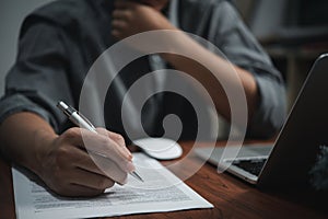 businessman agree to make deal signing document, sale contract or legal transaction contract at desk