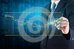 Businessman analyze stock market charts
