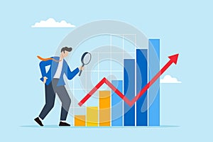 Businessman analyzes graph using magnifying glass, illustrating transparency in company operations