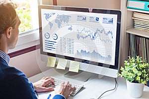Businessman analyzing Business Analytics dashboard with KPI, financial metrics, fintech