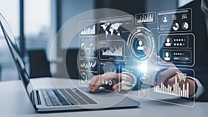Businessman analyzing data on virtual screen panel