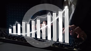 Businessman Analyzing Financial Growth with Digital Graphs and Data on Computer Screen in Modern Workspace Copula