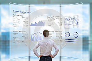 Businessman analyzing financial report data company operations, balance sheet, fintech photo
