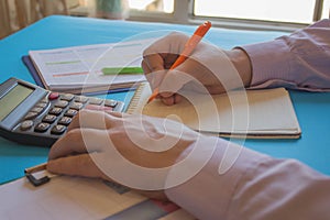 Businessman analyzing report, business performance concept. Businessperson working in office