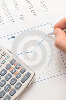 Businessman analyzint profit graph