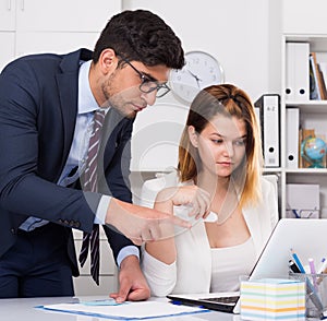 Businessman angry to female coworker