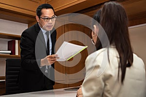 Businessman arguing about works in a meeting.