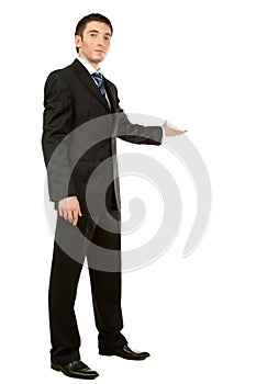 Businessman with arm out in a welcoming gesture