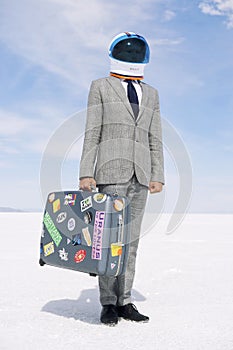Businessman Astronaut Traveling on Moon Voyage with Suitcase photo