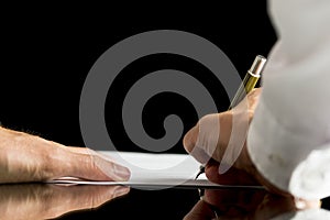 Businessman or attorney signing a document, contract or legal