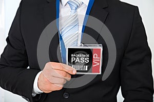 Businessman with backstage pass