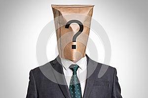 Businessman with a bag on the head - with question mark