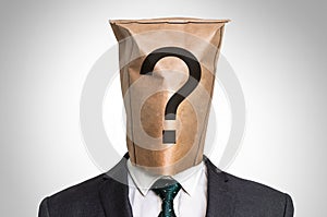 Businessman with a bag on the head - with question mark