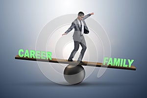 Businessman balancing between career and family in business conc
