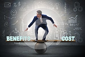 Businessman balancing between cost and benefit in business conce