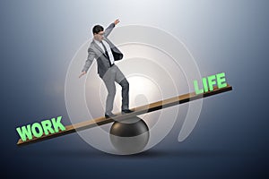 The businessman balancing between work and life in business concept