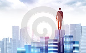 Businessman on bar chart looking at city