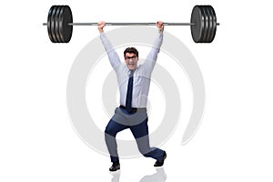 The businessman with barbell in heavy lifting concept