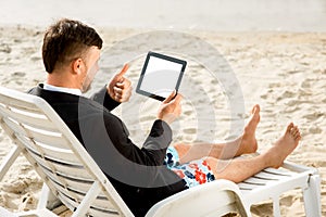 Businessman on the beach