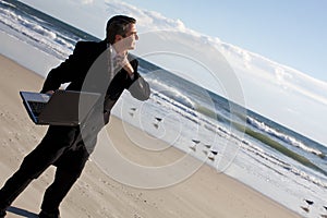 Businessman on the beach