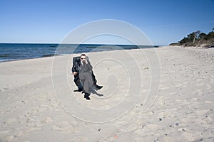 Businessman on beach, forward