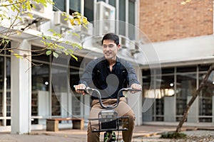 Businessman and bicycle in city to work with eco friendly transport. happy businessman professional riding a bicycle in