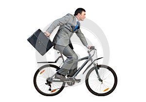 Businessman on bike hurry to work