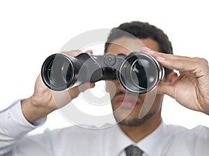 Businessman and binoculars