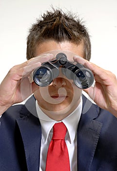 Businessman binoculars.