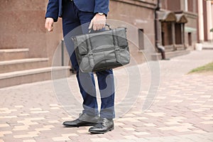 Businessman with black briefcase