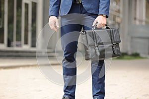 Businessman with black briefcase