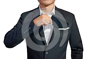 Businessman in black suit hand putting smartphone in suit bag isolate with clipping path is on white background