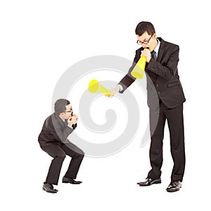 Businessman blame or encourage to worker with megaphone